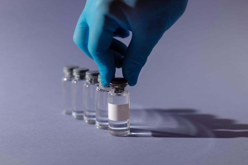 Scientists in laboratory developing affordable vaccine for 2026 global healthcare access